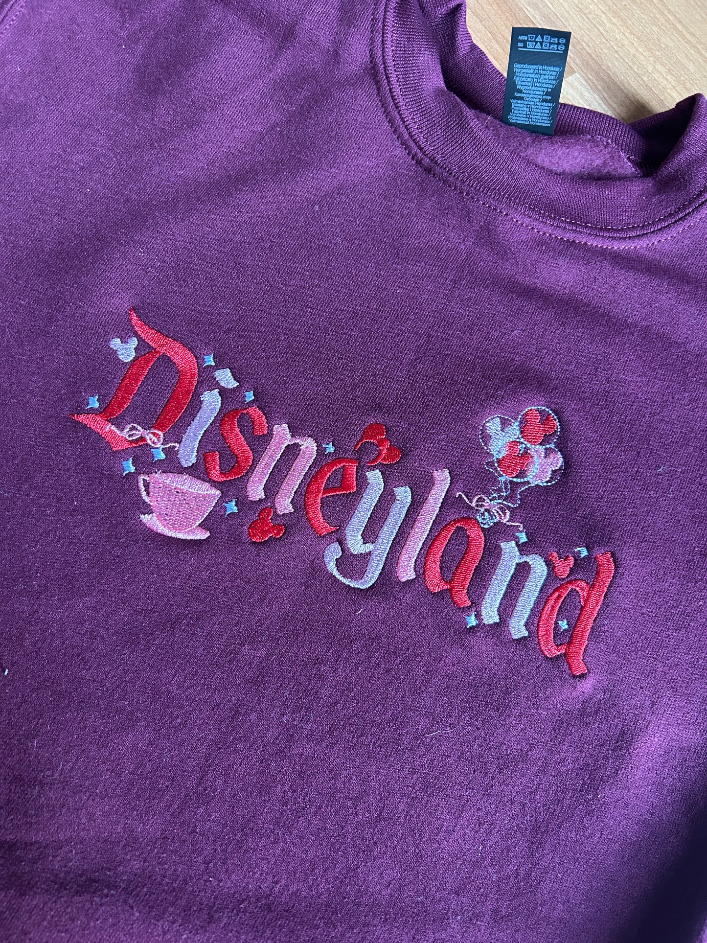 The Happiest Place in Red Embroidered Sweater